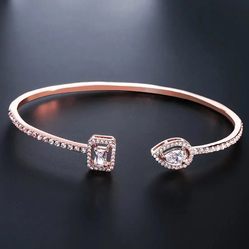 Elegant Gold Color Geometric Bangle with Sparkling Zircon Detail