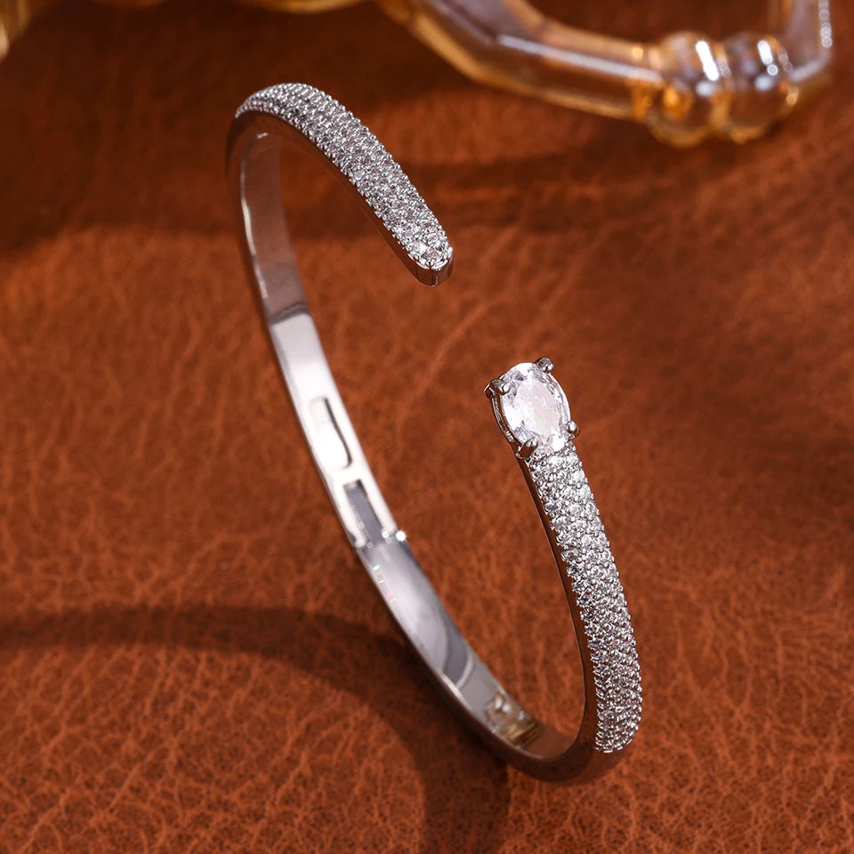 Elegant Gold Color Geometric Bangle with Sparkling Zircon Detail