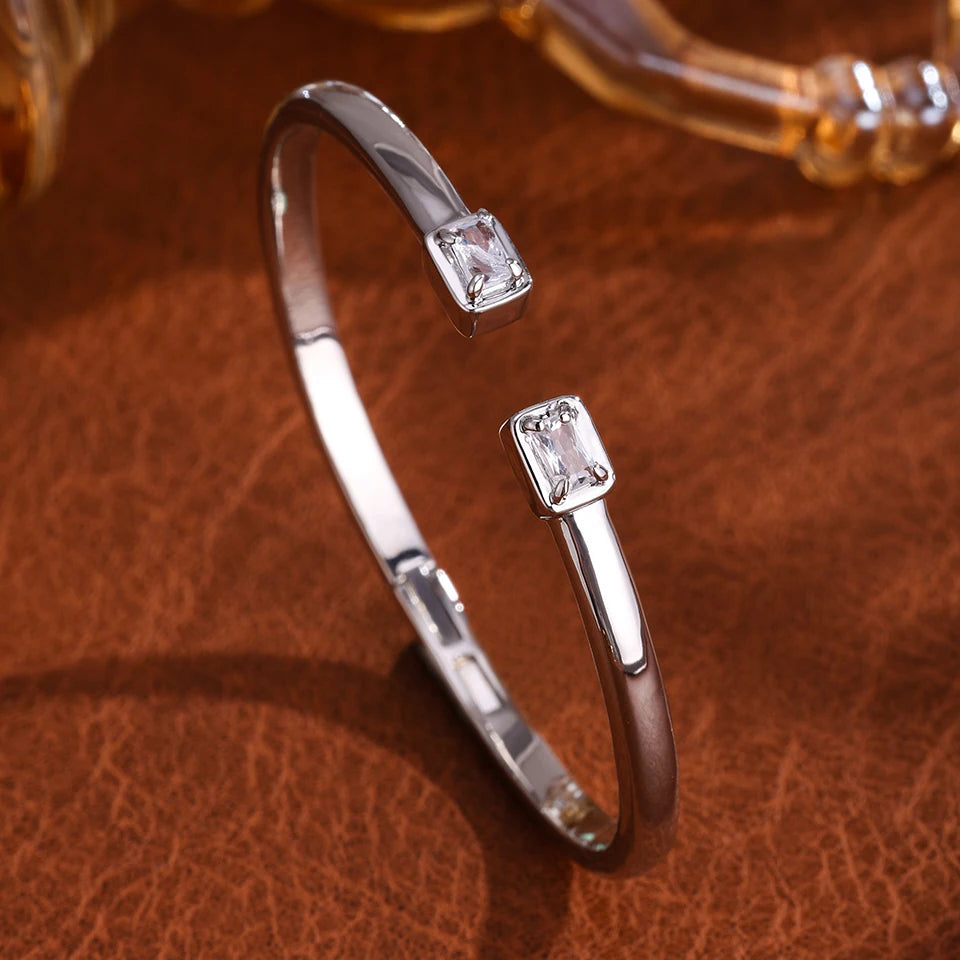 Elegant Gold Color Geometric Bangle with Sparkling Zircon Detail